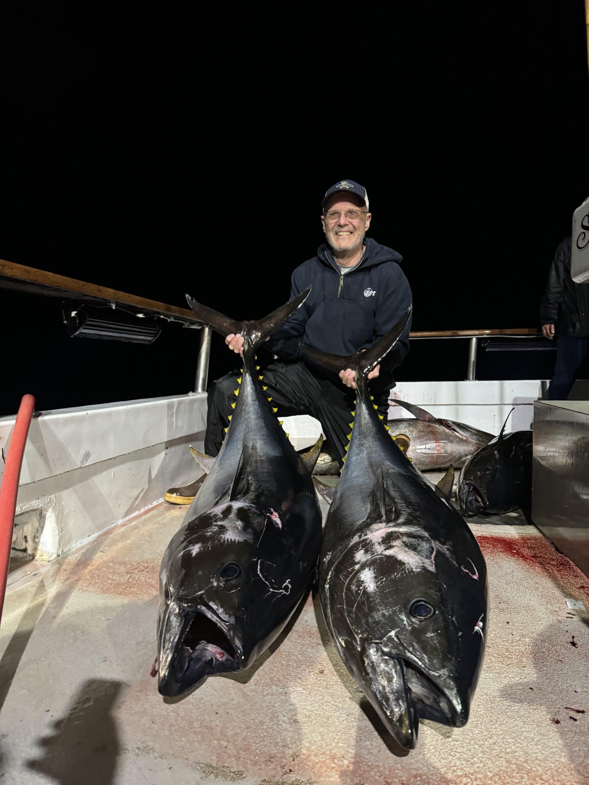 Angler with two bluefin tunas.