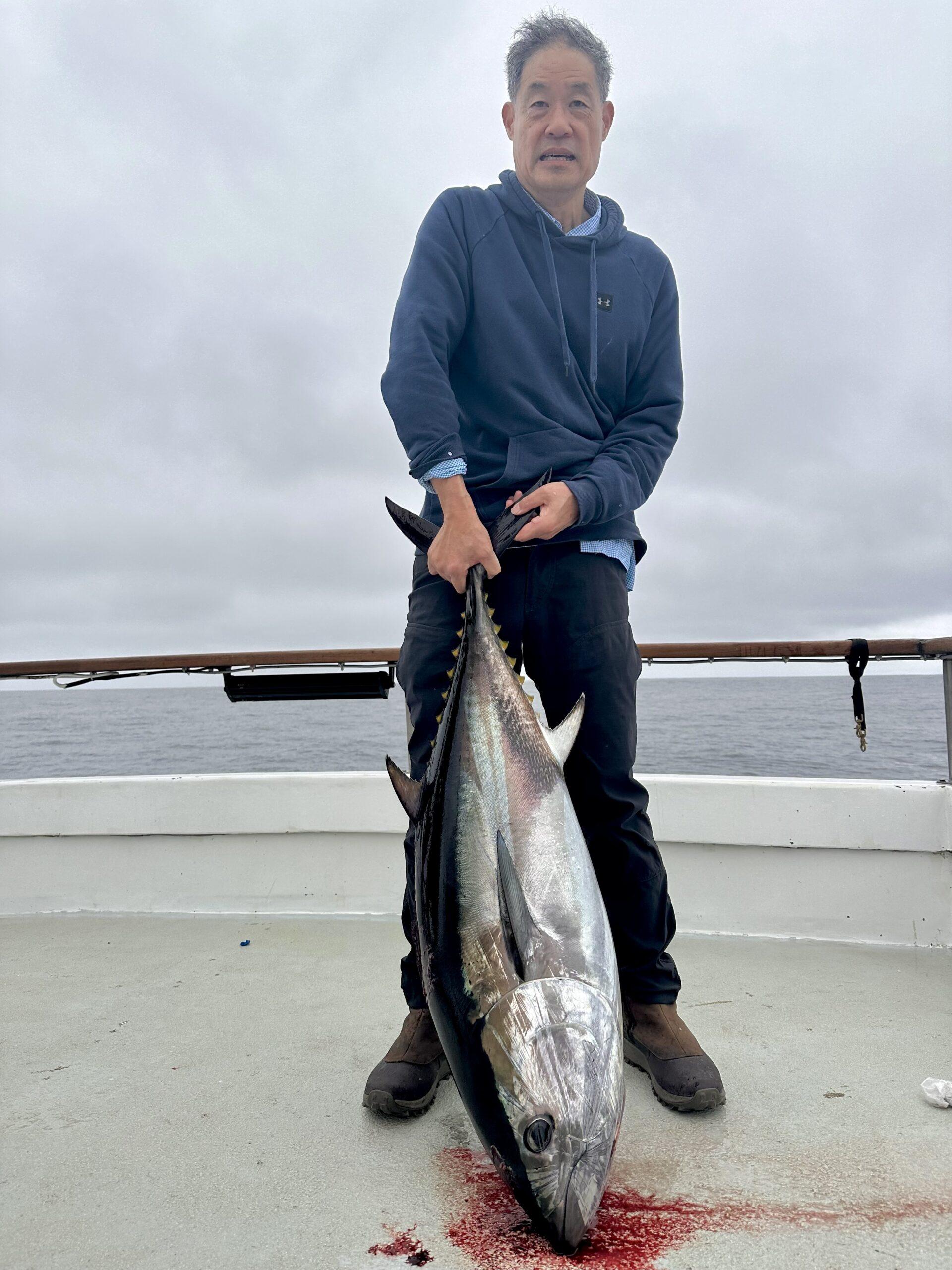 Angler caught a bluefin in the Pacific Ocean.