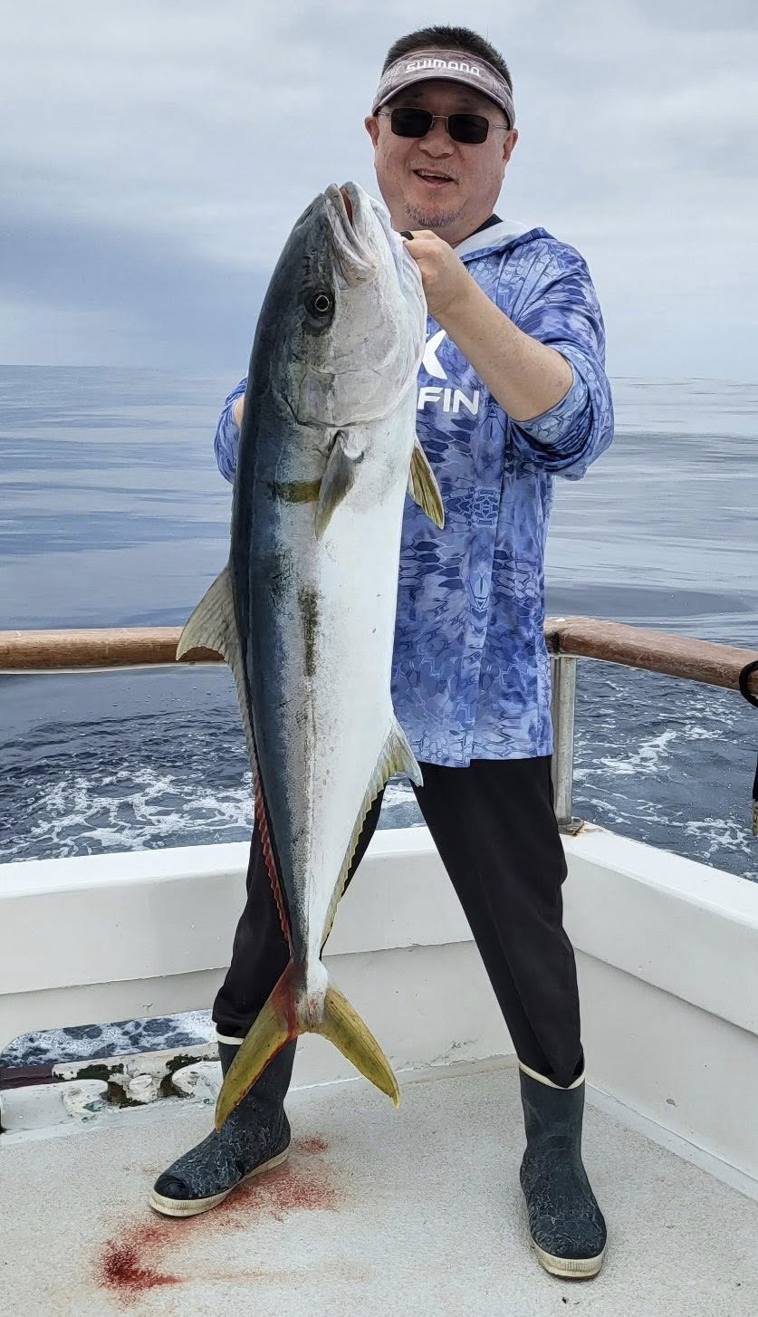 Anglers with Yellowtail Fish