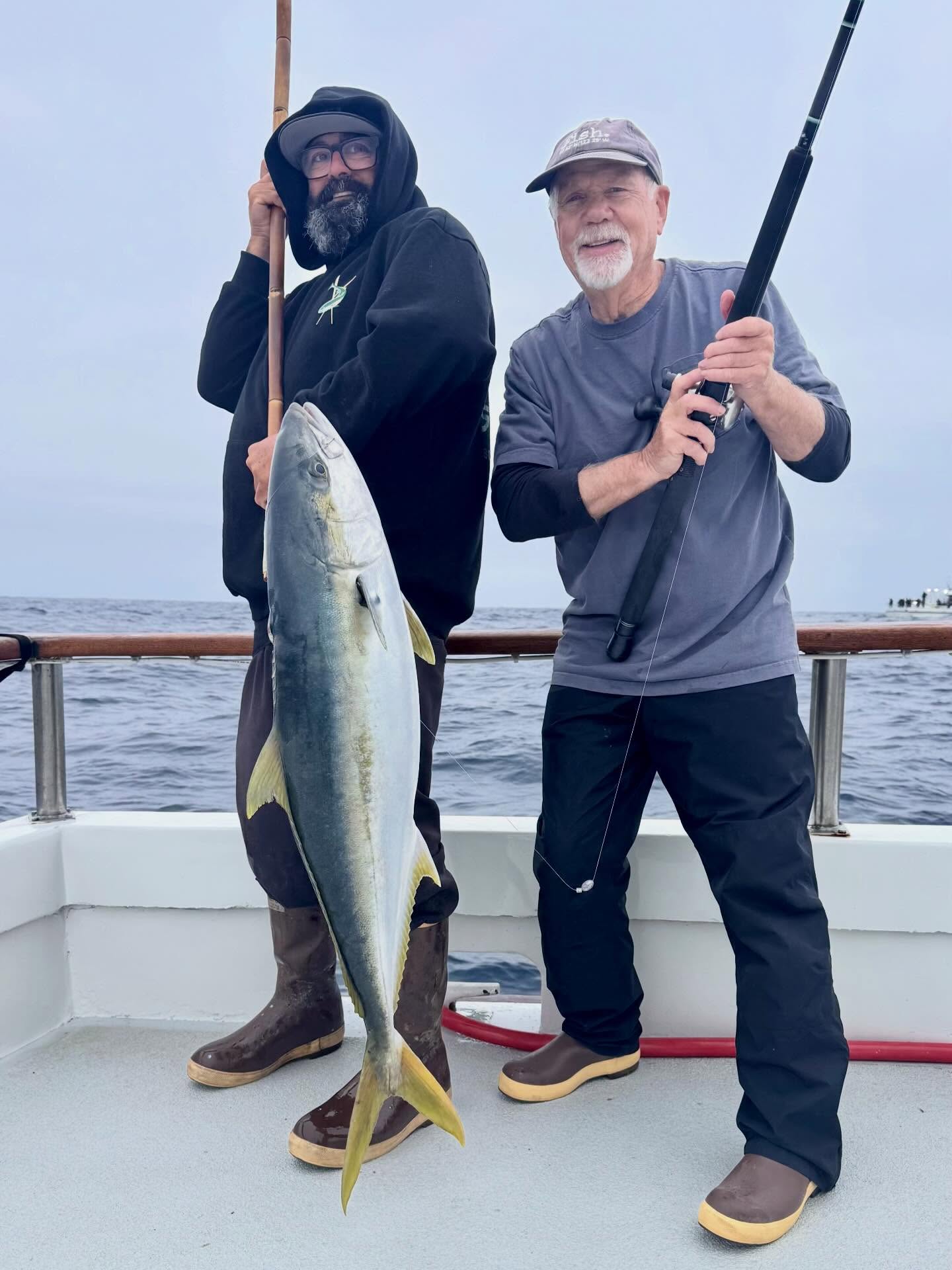 Angler with Yellowtail Fish