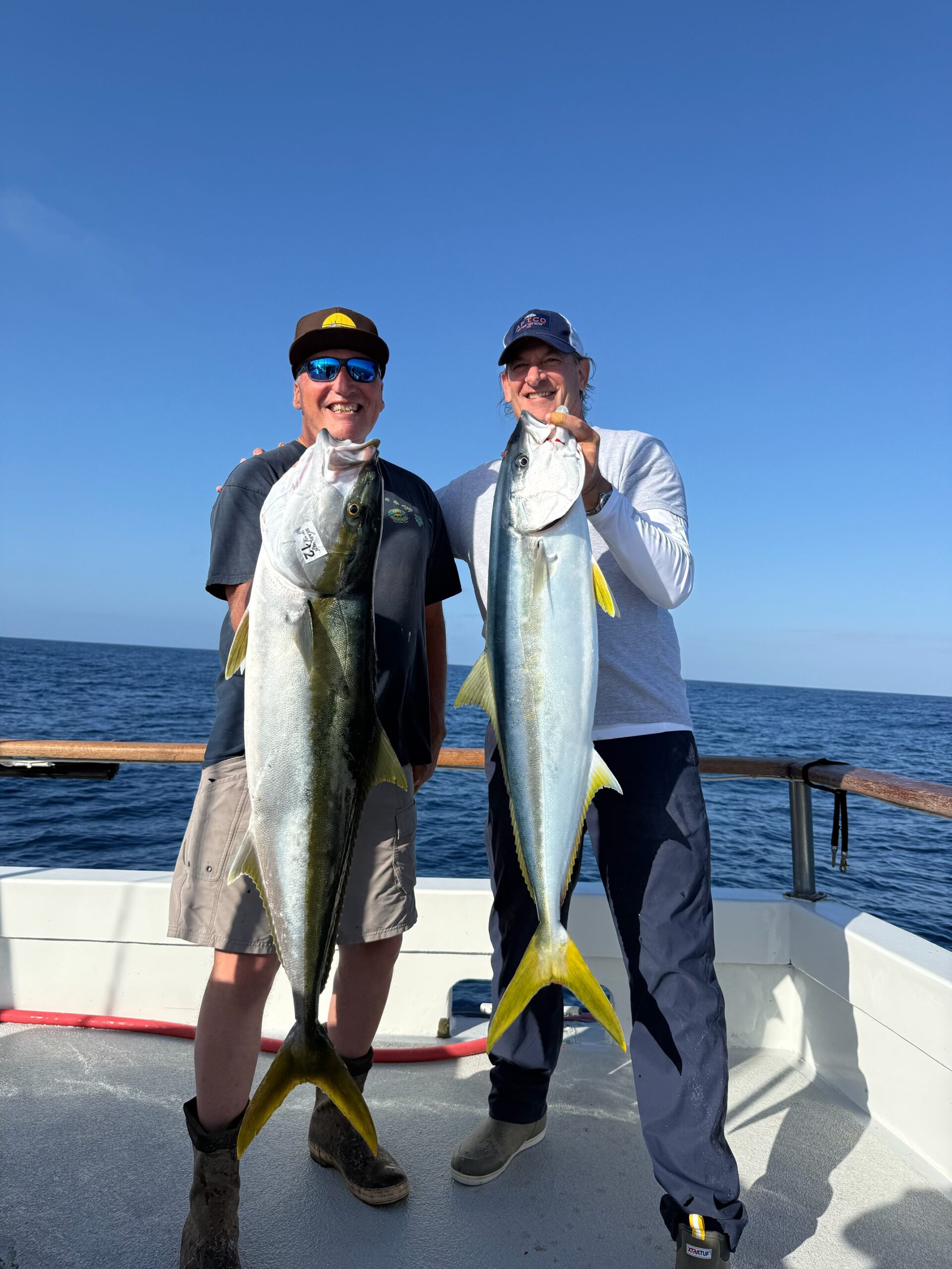 Anglers with Yellowtail Fish