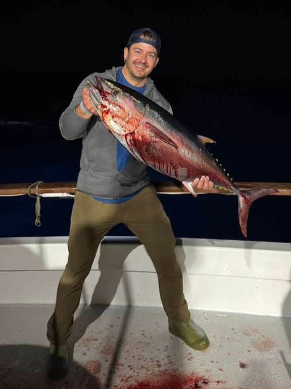 Searcher night fishing for bluefin tuna